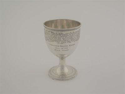 Appraisal: A small George III goblet engraved with a frieze of