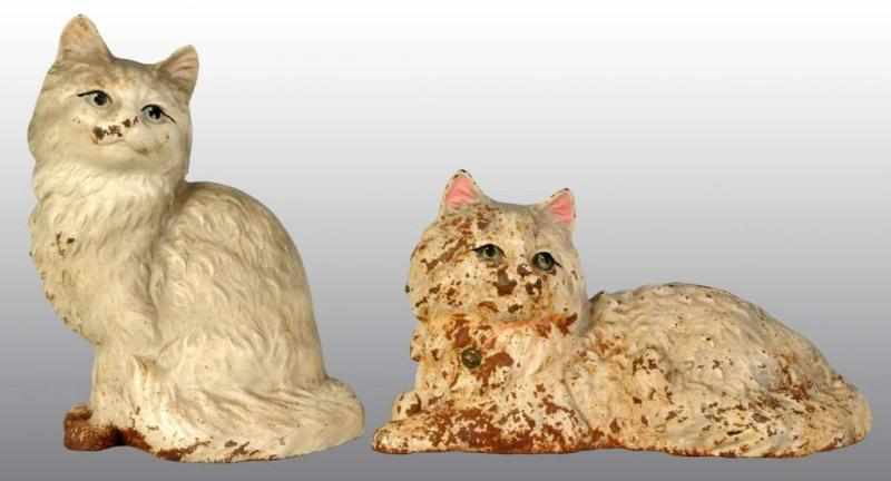 Appraisal: Lot of Cast Iron Persian Cat Doorstops Description Sitting cat