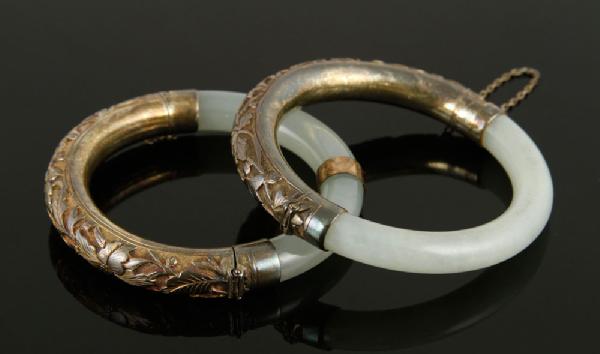 Appraisal: - Pair of Chinese Jade and Carved Silver Bracelets Pair