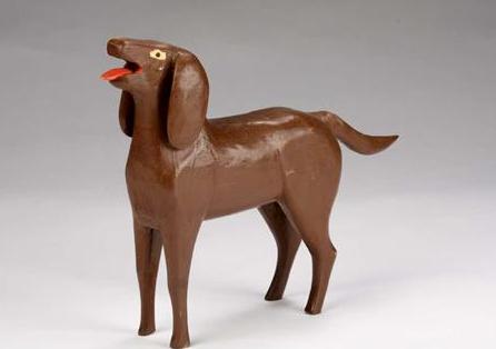 Appraisal: FOLK ART CARVED AND BROWN PAINTED FIGURE OF A DOG