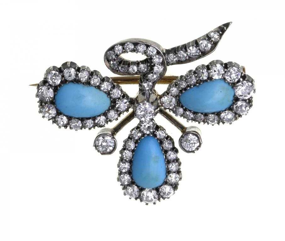 Appraisal: A DIAMOND AND TURQUOISE CLOVER LEAF BROOCH with diamond stalk