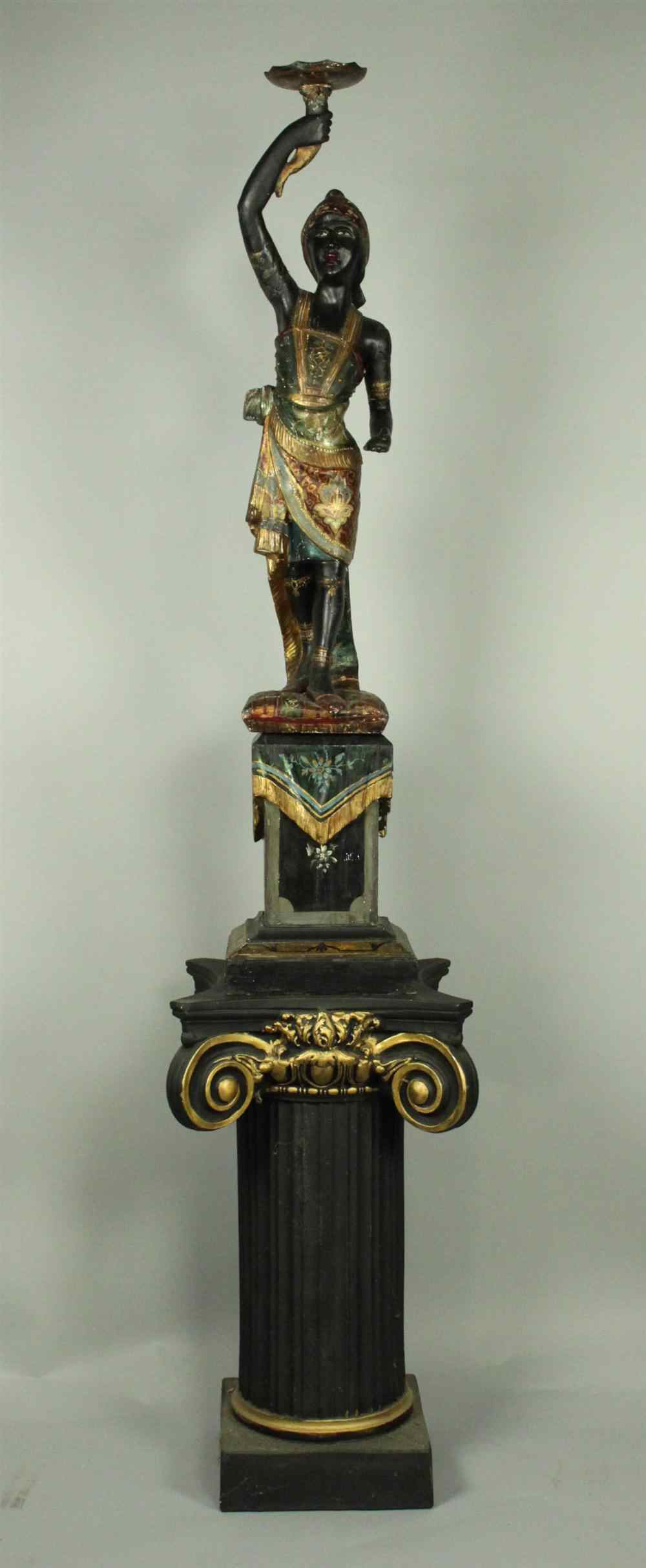 Appraisal: POLYCHROME AND GILTWOOD BLACKAMOOR AND STAND TH CENTURY the figure