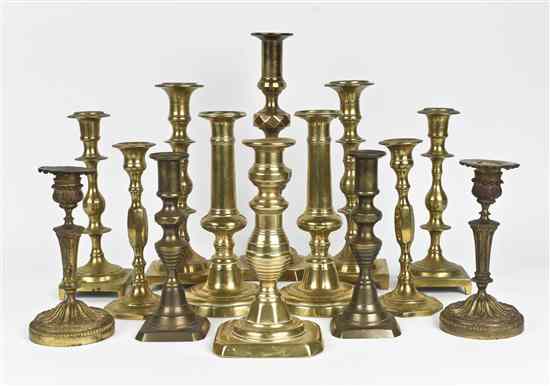 Appraisal: A Collection of Fourteen Brass Candlesticks of various forms and