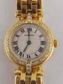 Appraisal: An carat gold lady's diamond set Cartier wrist watch numbered