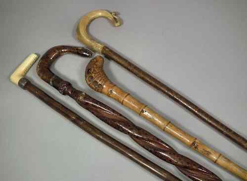 Appraisal: An early th Century hardwood walking cane with ivory terminal