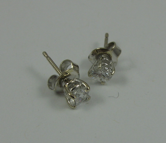 Appraisal: PAIR OF DIAMOND AND K WHITE GOLD EAR STUDS each