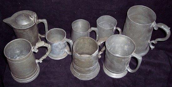 Appraisal: A Victorian pewter tankard of bulbous shape marked Gallon and