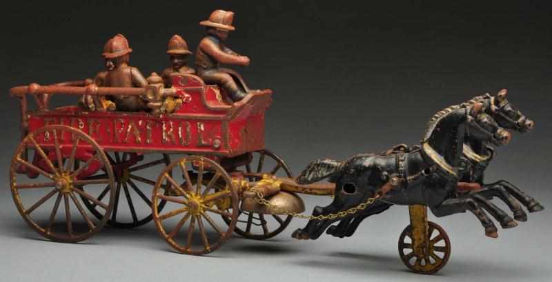 Appraisal: Cast Iron Kenton Fire Patrol Horse-Drawn Toy Description American Comes