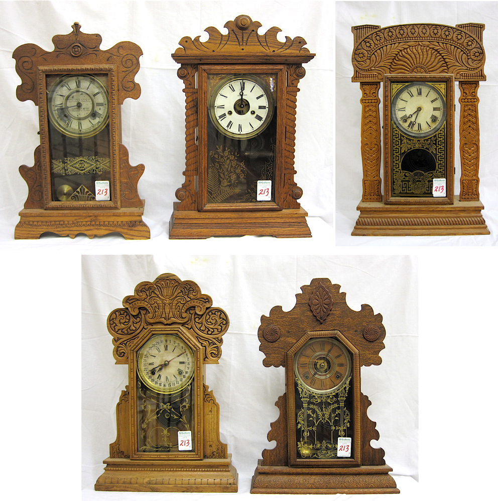 Appraisal: FIVE AMERICAN OAK CASED KITCHEN CLOCKS all having springwound time