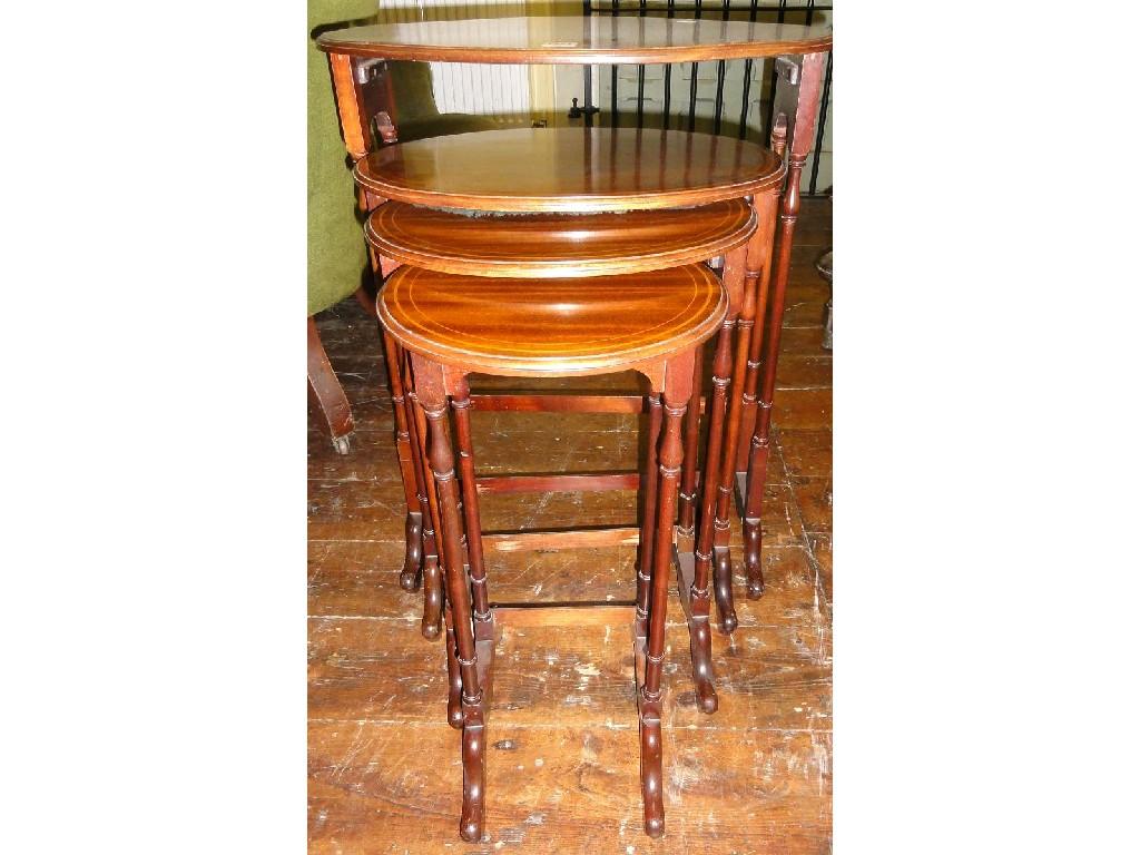 Appraisal: An Edwardian quartetto nest of graduated occasional tables of oval