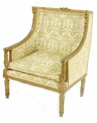 Appraisal: A late th century French giltwood wing armchair the carved