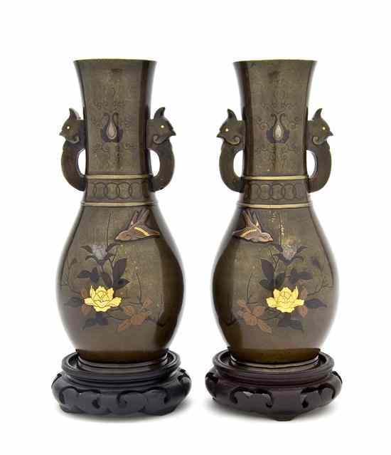 Appraisal: A Pair of Japanese Bronze and Mixed Metal Inlaid Vases