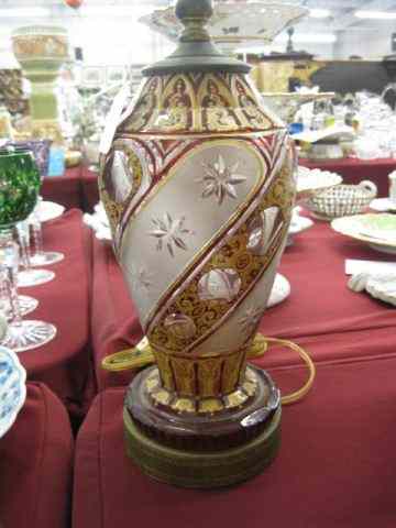 Appraisal: Bohemian Ruby Cut-to-Clear Lampwith frosted star cut trim gold decoration