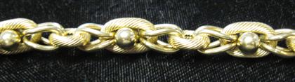 Appraisal: karat yellow gold toggle braceletAlternating rope twist and polished links