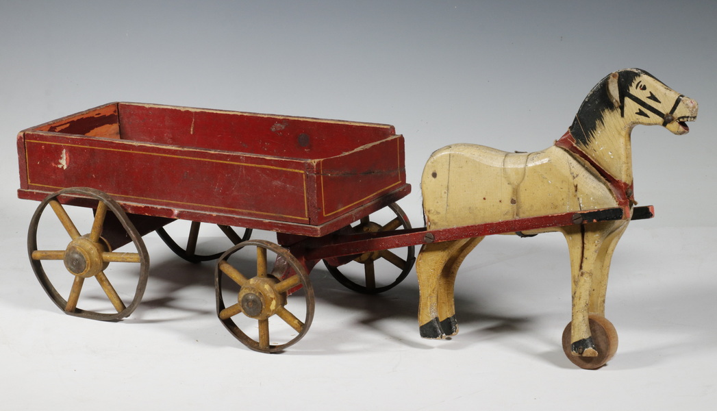 Appraisal: CIRCA TOY WAGON WITH VERMONT TOY CATALOG One Horse Wagon