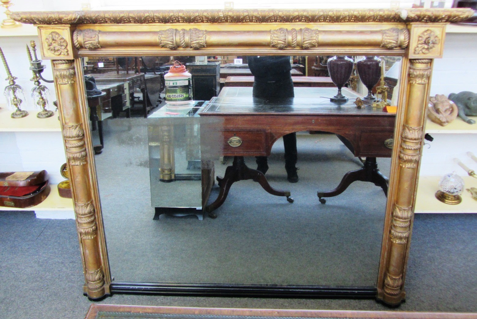 Appraisal: A large William IV gilt framed overmantel mirror with split