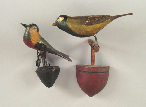 Appraisal: Two carved and painted bird wall mounts late th c