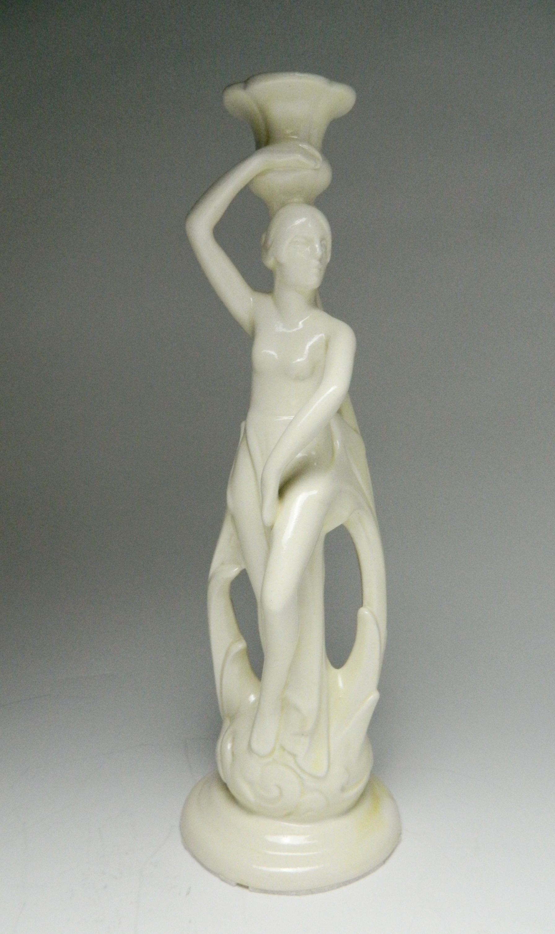 Appraisal: Cowan pottery candle holder mold R a swirling nude intertwined