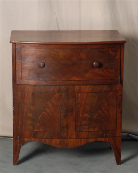 Appraisal: A Late Georgian Bow-front Mahogany Commode with ebony stringing having