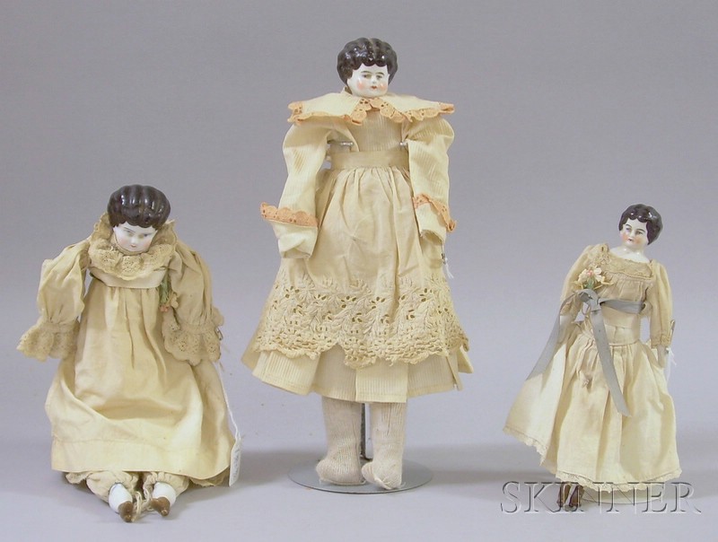 Appraisal: Three Black-Haired China Dolls one marked Germany all three with