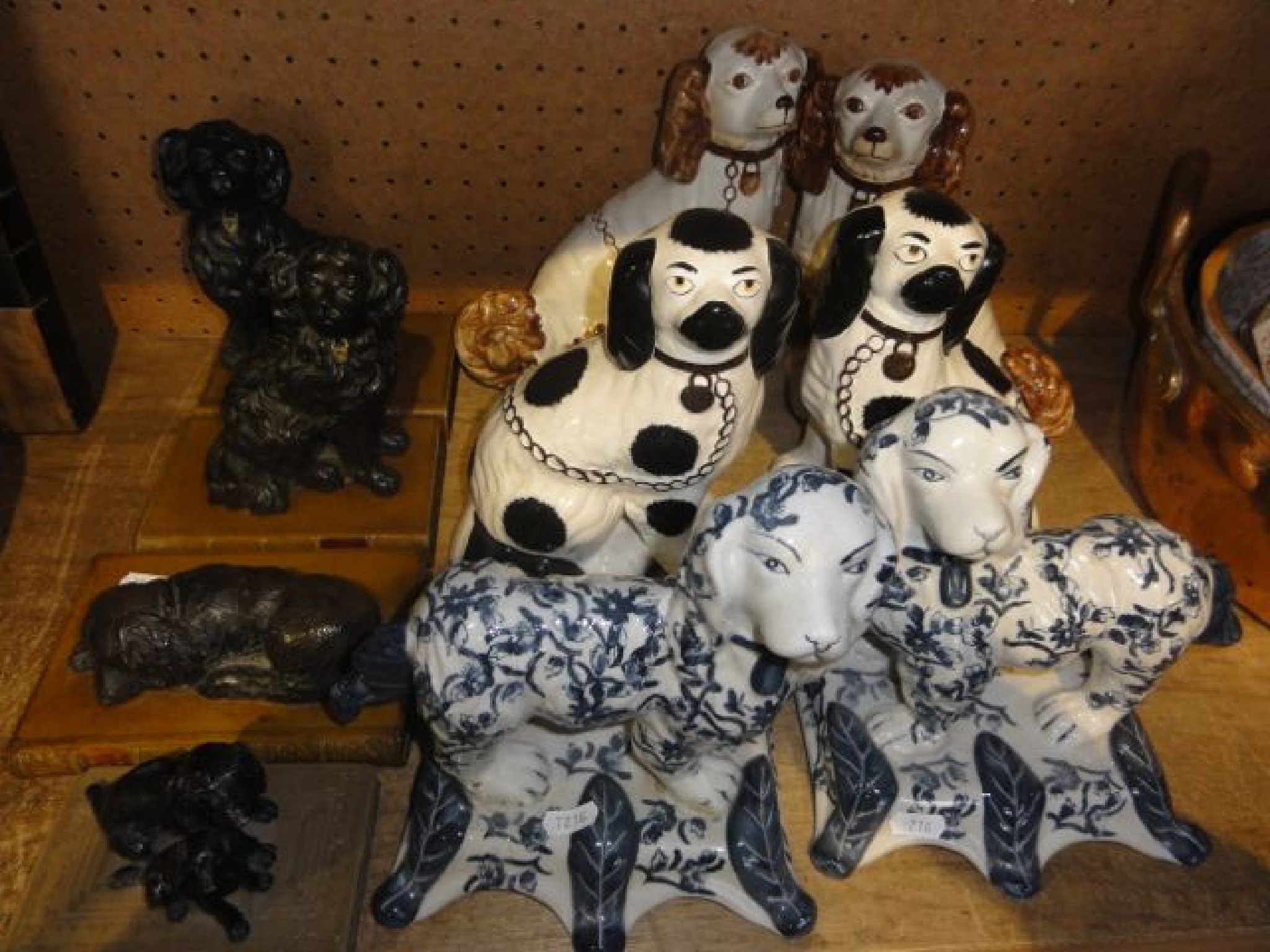 Appraisal: Two reproduction pairs of Staffordshire type ceramic spaniels together with