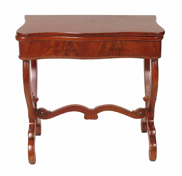 Appraisal: A Victorian mahogany games table height in width in depth