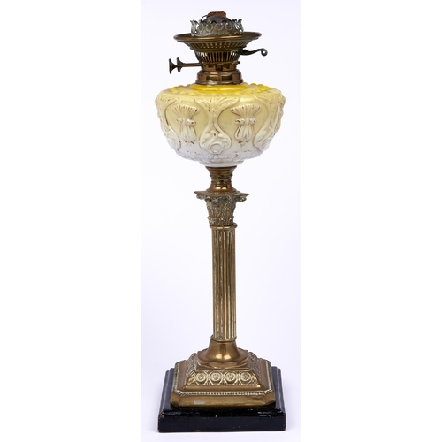 Appraisal: An Edwardian brass Corinthian column oil lamp with press moulded