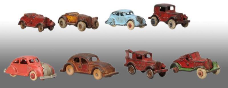 Appraisal: Lot of Cast Iron Vehicle Toys Description American Largest toy