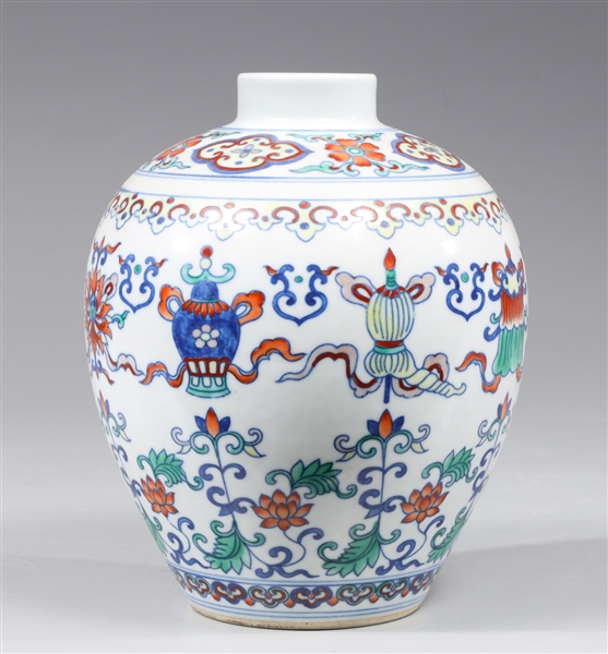 Appraisal: Chinese wucai enameled porcelain jar with object and floral designs