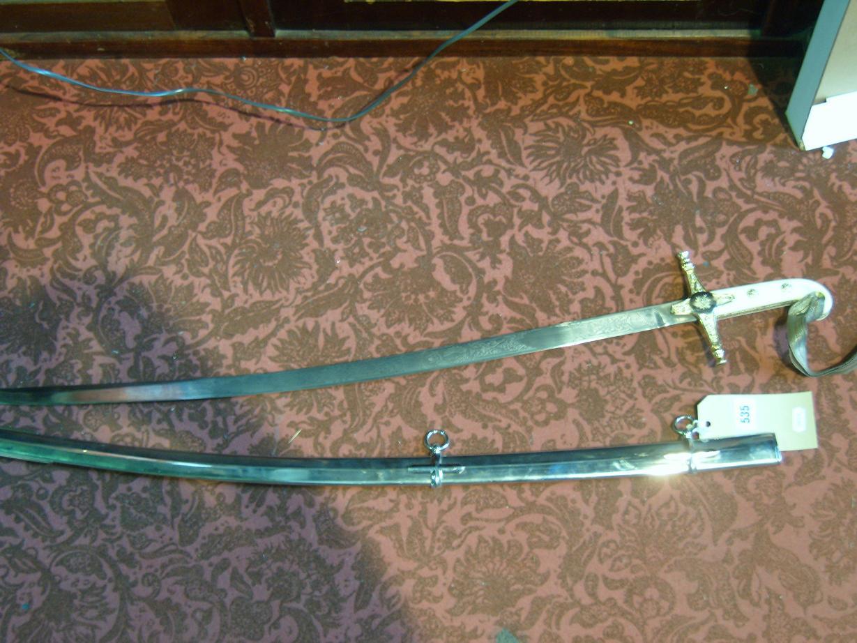 Appraisal: A reproduction Officers dress sword plated scabbard and engraved blade