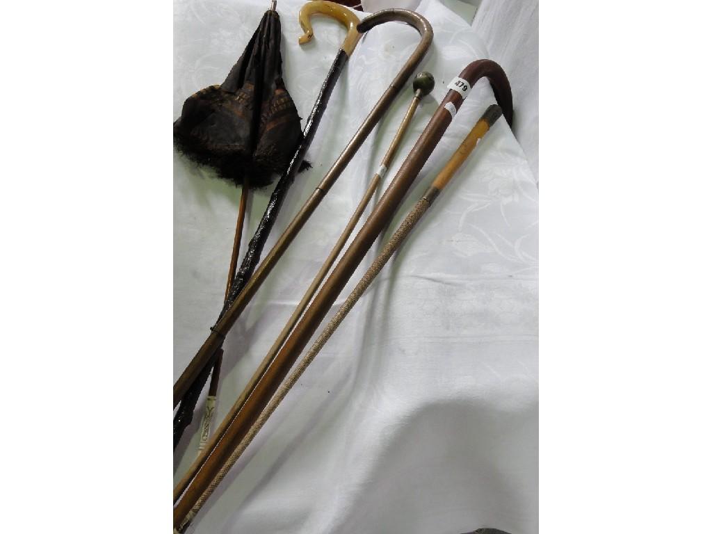 Appraisal: A miscellaneous collection of walking sticks a shepherd's crook with