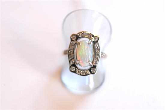 Appraisal: AN OPAL AND DIAMOND CLUSTER RING IN CT GOLD