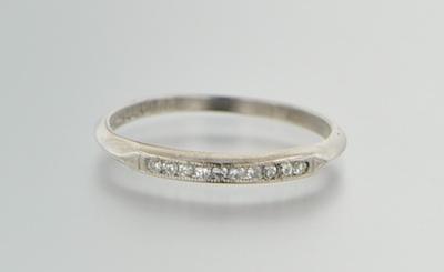 Appraisal: A Ladies' Palladium and Diamond Band A delicate palladium ring