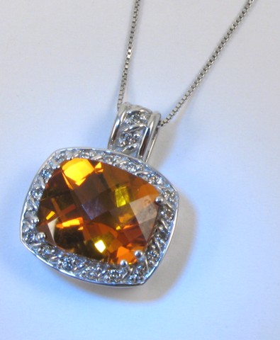 Appraisal: CITRINE AND DIAMOND PENDANT NECKLACE with appraisal The pendant is