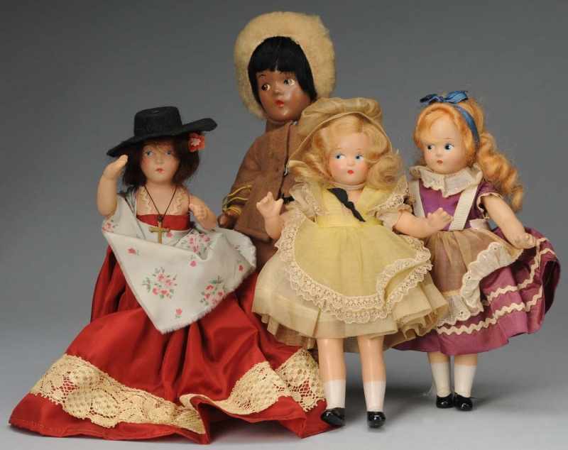 Appraisal: Lot of Composition Dolls Description American Ca - s Madame