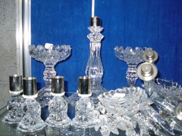 Appraisal: A clear glass candelabra with four sconces