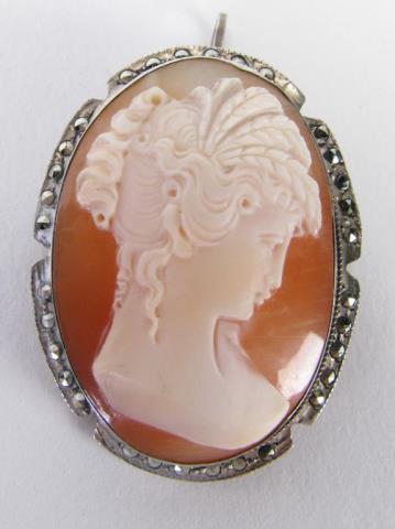 Appraisal: A vintage cameo pin pendant with marcasite accents set in