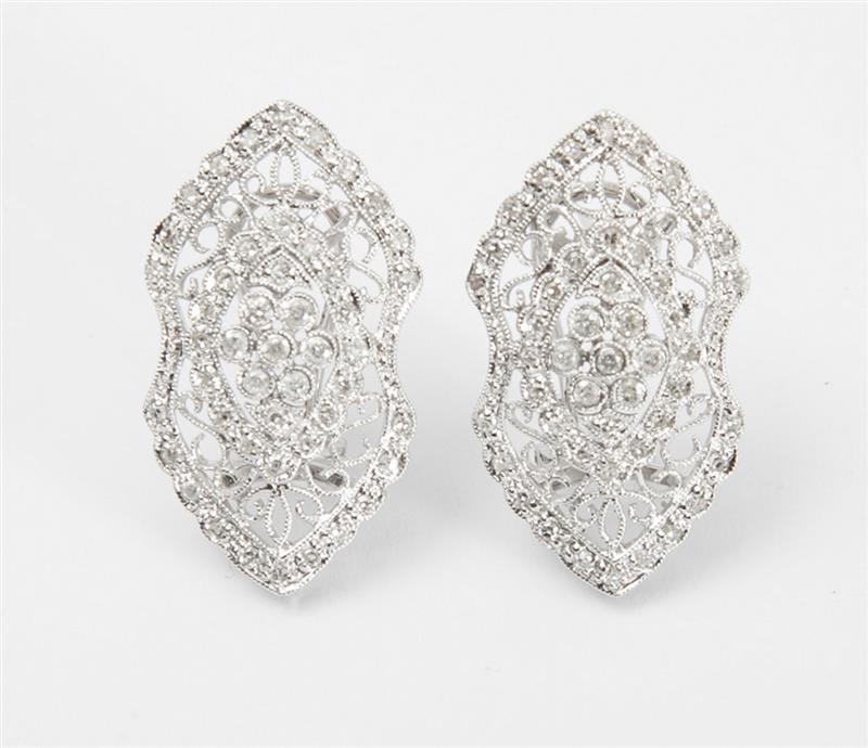 Appraisal: K WHITE GOLD AND DIAMOND EARCLIPS Filigree set with single-cut