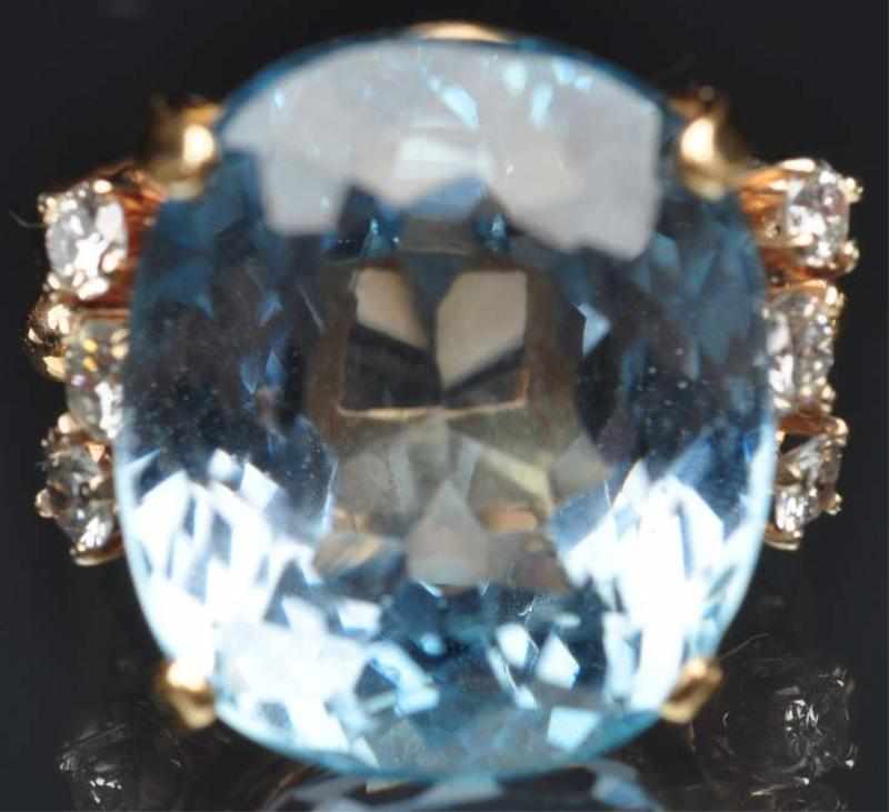 Appraisal: K Y Gold Ladies Ring With blue topaz and six