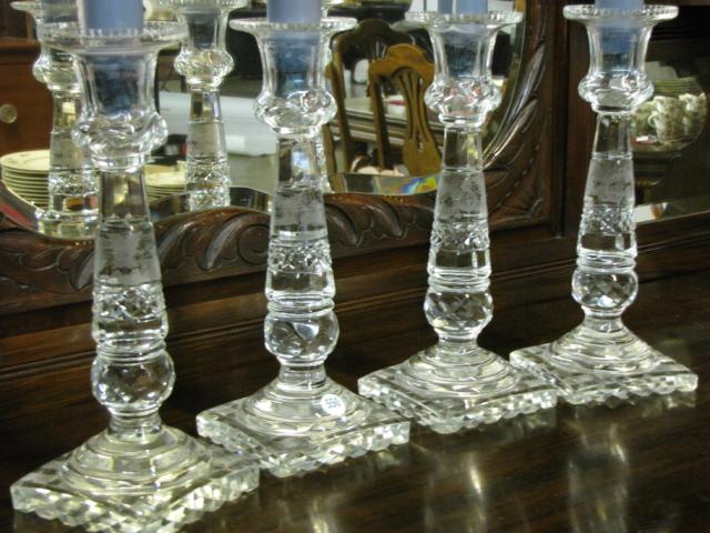 Appraisal: Set f four etched pattern crystal candle sticks high with