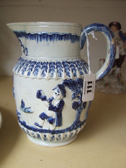 Appraisal: A Pearlware relief moulded jug Parson Clerk and Sexton circa