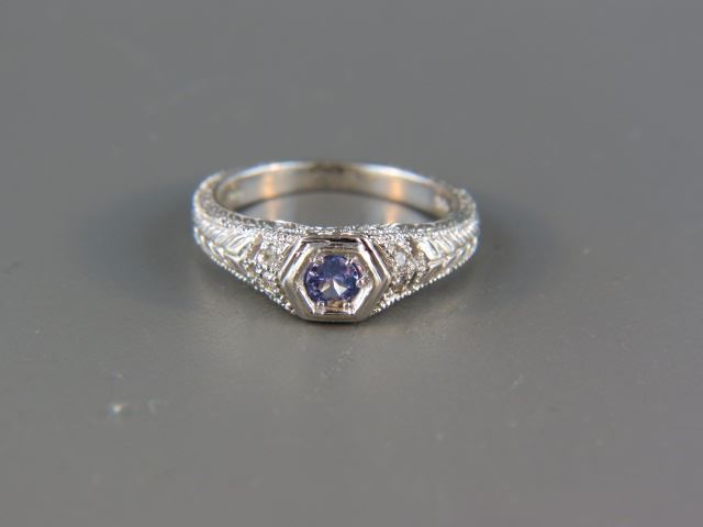 Appraisal: Tanzanite Diamond Ring oval carat gem and small diamonds in