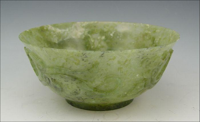 Appraisal: CHINESE CARVED SERPENTINE STONE BOWL Exterior carved '' dia