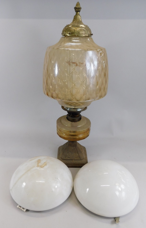 Appraisal: A Victorian oil lamp with later shade and two ceiling