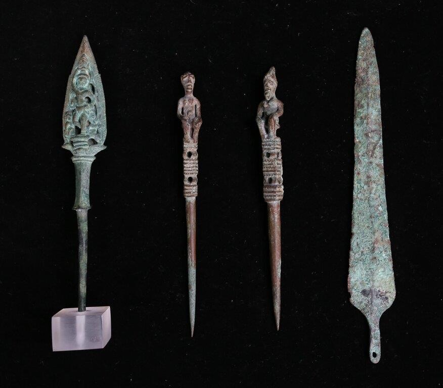 Appraisal: patinated bronze items blade figural pins and a Buddhist arrow