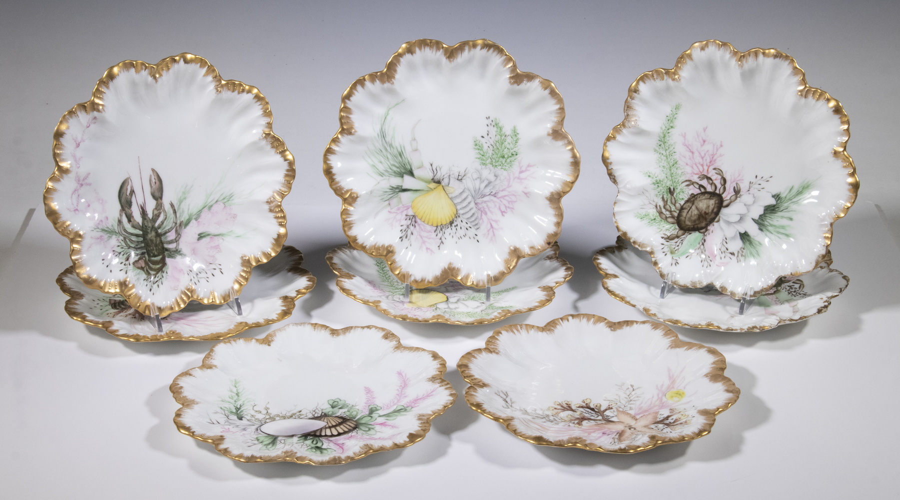 Appraisal: LANTERNIER LIMOGES SEAFOOD PLATES Set of Hand Painted French Porcelain