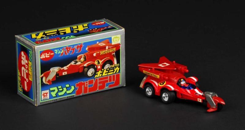 Appraisal: Popinika Machine Gantetsu Die-Cast Vehicle Description Japanese Made by Popy