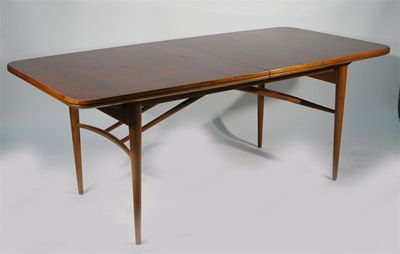 Appraisal: An Archie Shine Heritage wishbone extending dining table designed by