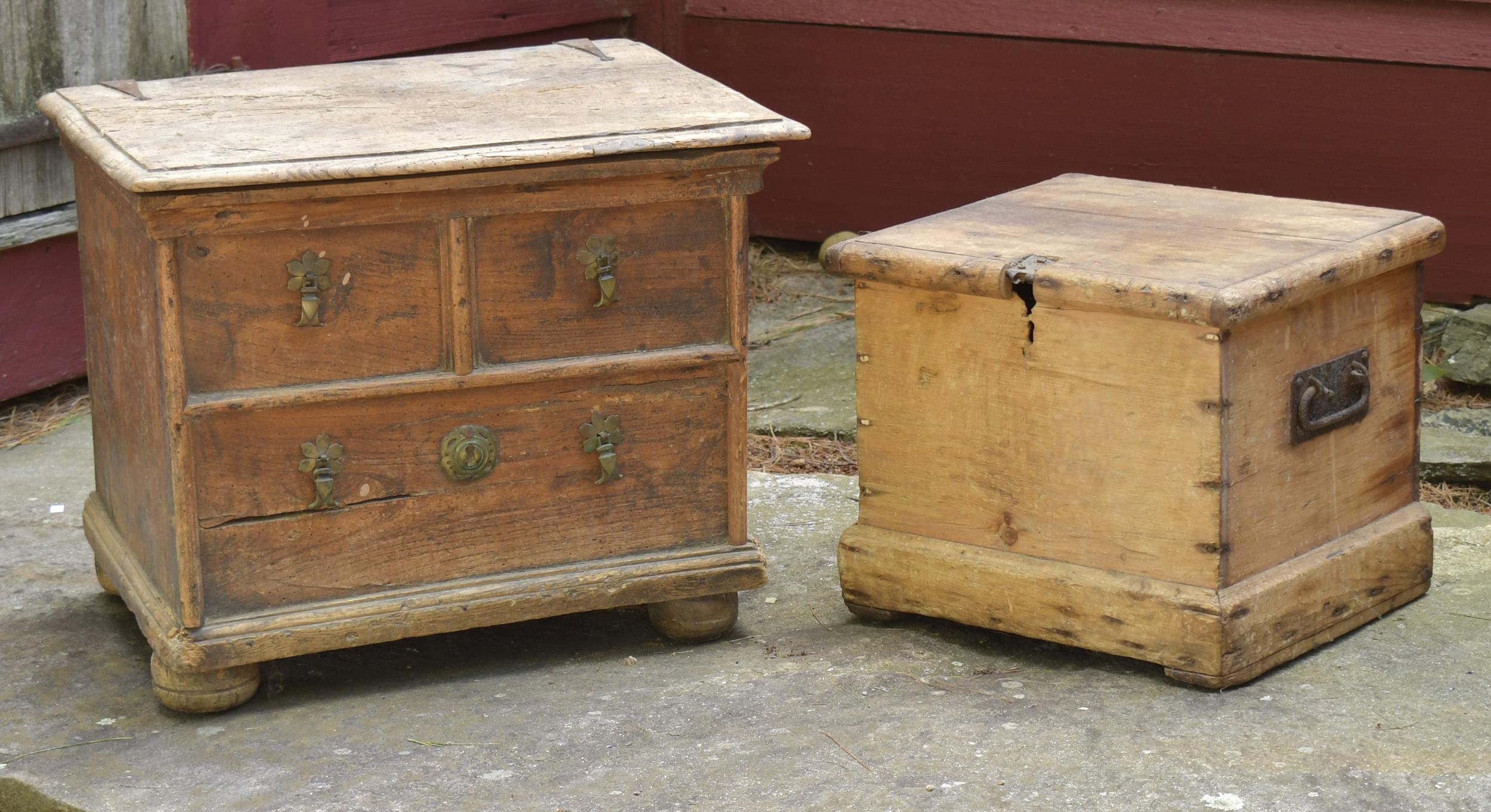 Appraisal: TWO SMALL ANTIQUE LIFT TOP TRUNKS Early th C pine