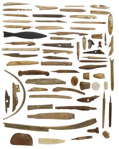 Appraisal: lot Antique and fossilized tools bone wood and sea life